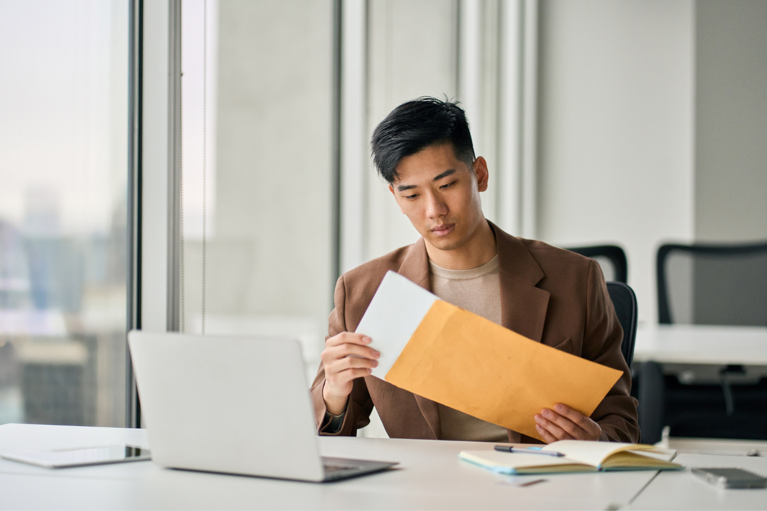 registered agent receives official business documents at his desk